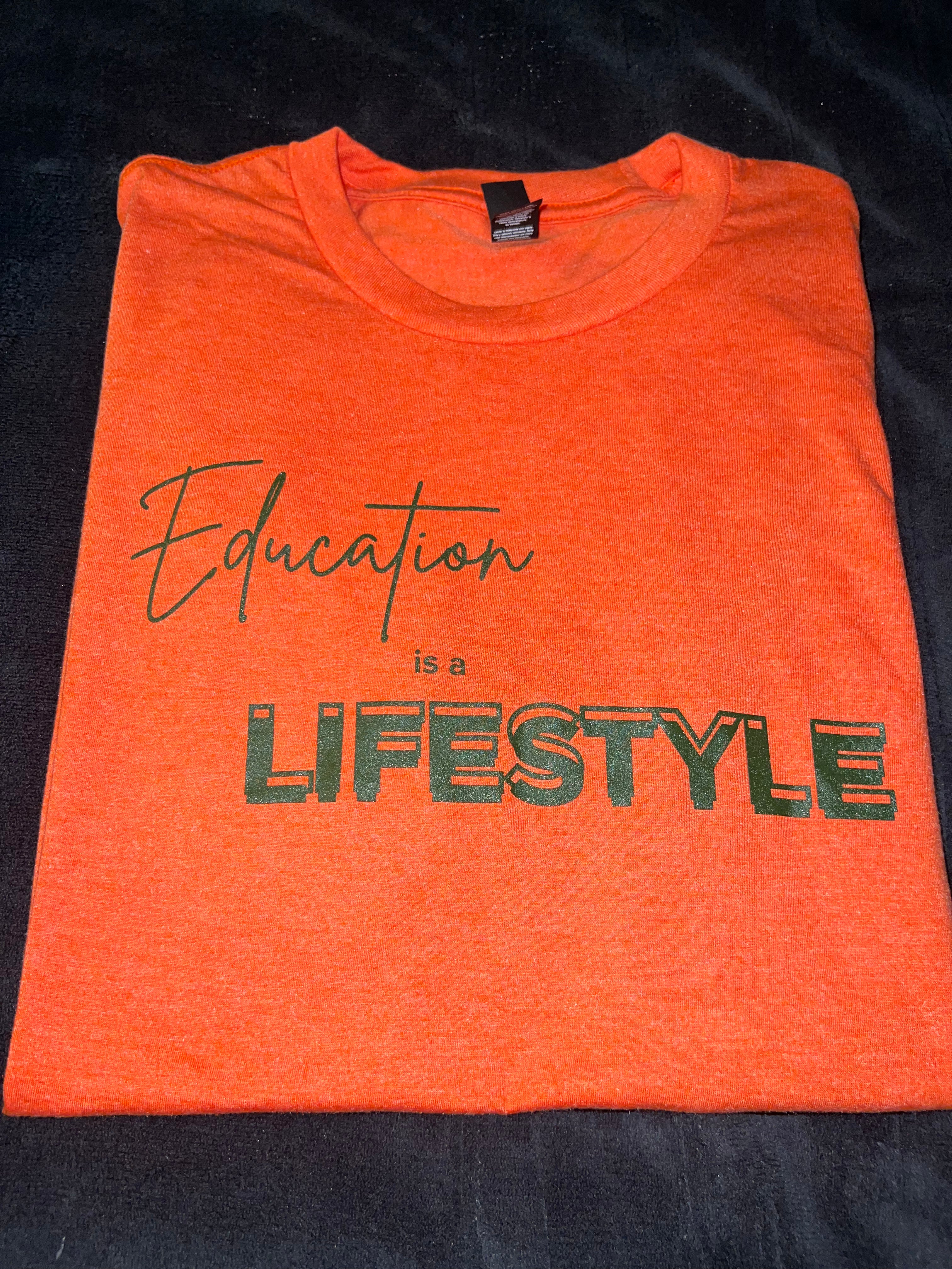 Orange T-Shirt with Green Writing
